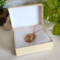 Brown Shell Tree of Life Copper Necklace in packaging